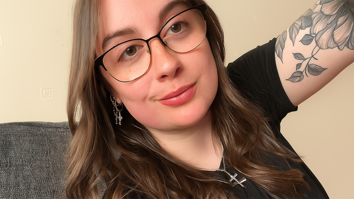 headshot of a female student wearing glasses