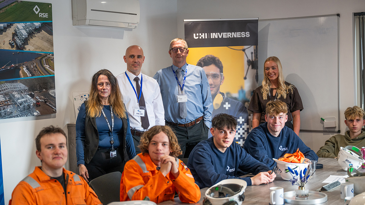 A group of apprentices and staff A group of apprentices and staff