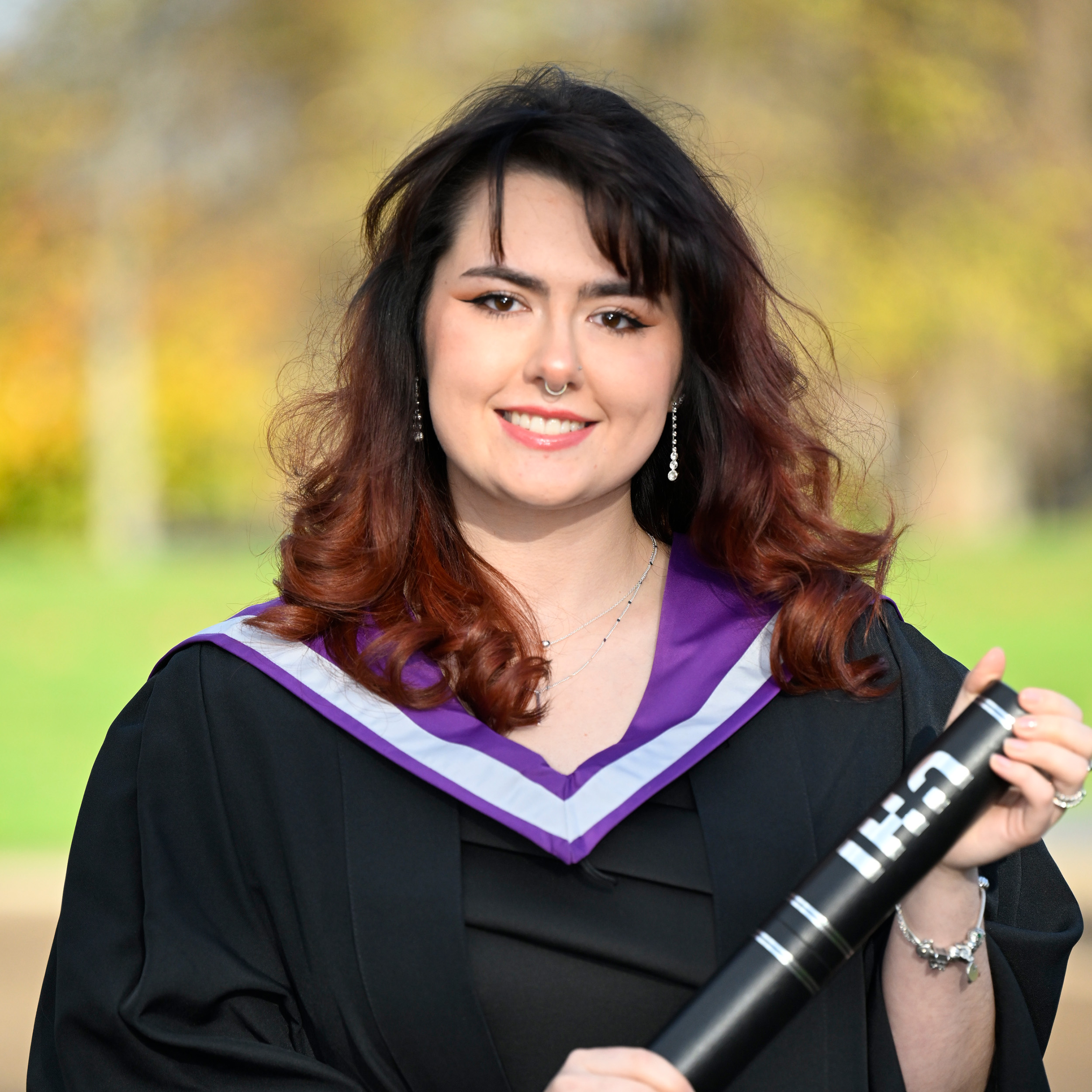 Zoe Nicoll holding a scroll Zoe Nicoll holding a scroll