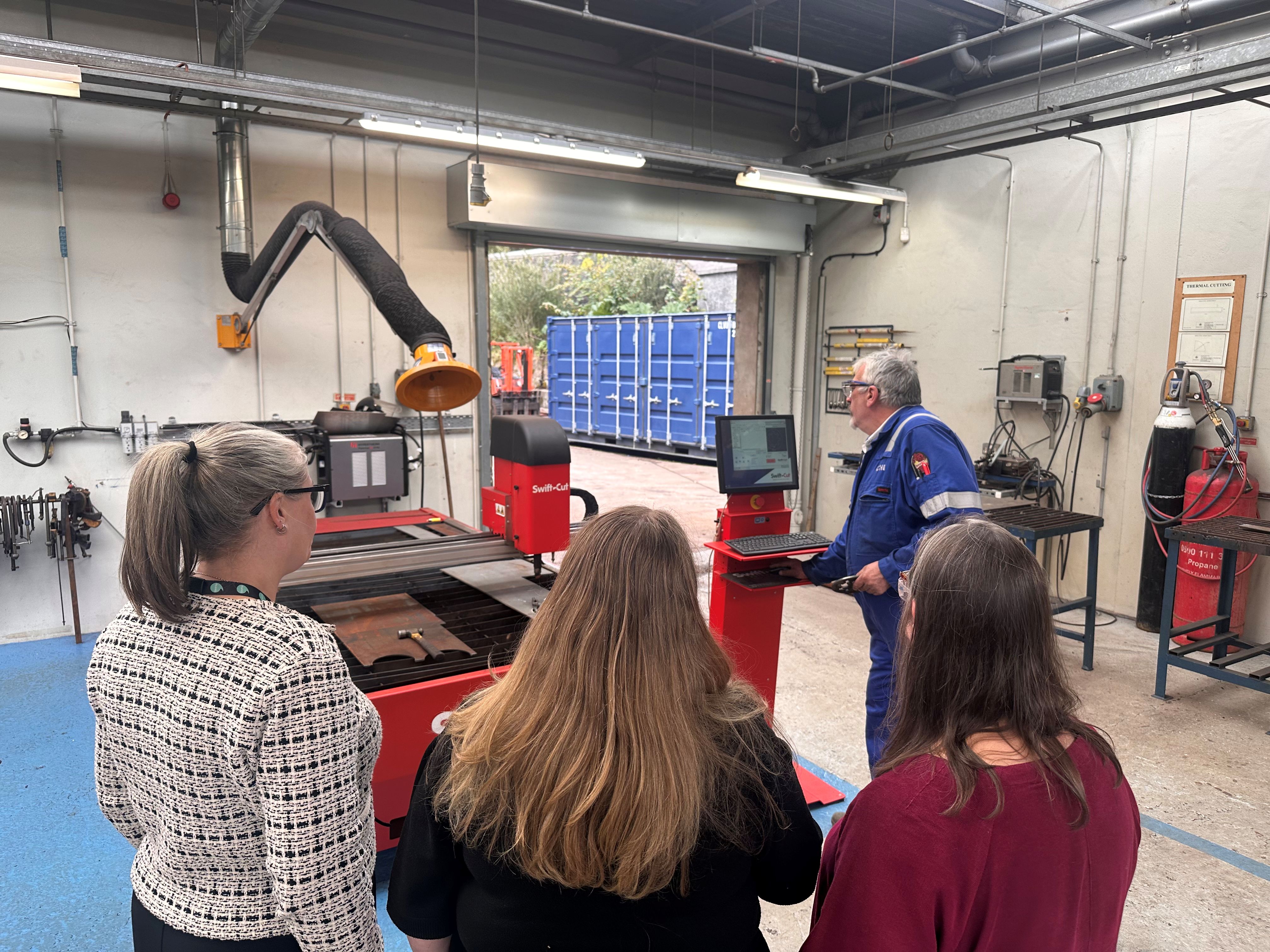Islands Forum attendees taking tour of Tech and Innovation Centre Islands Forum attendees taking tour of Tech and Innovation Centre