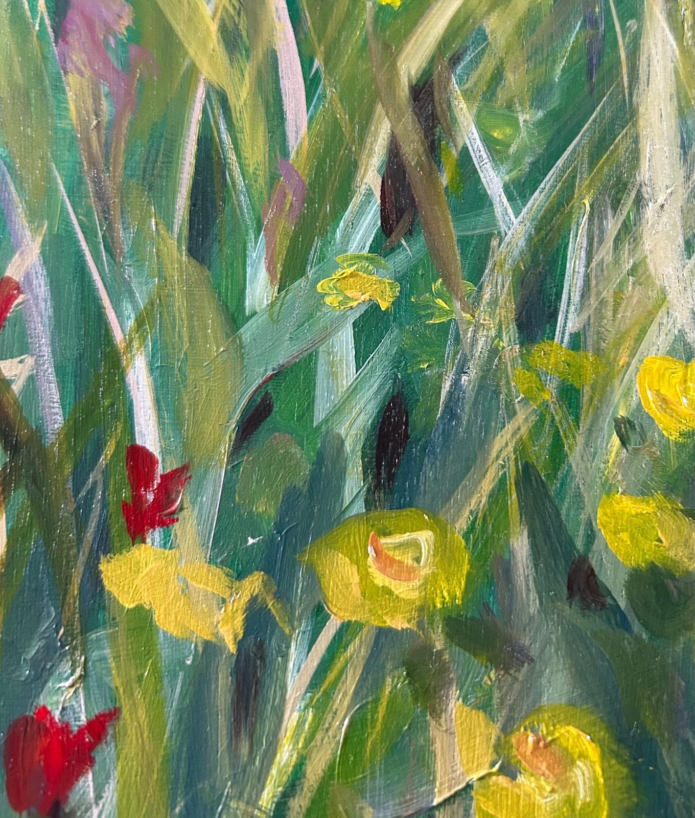 A painting with yellow and red flowers