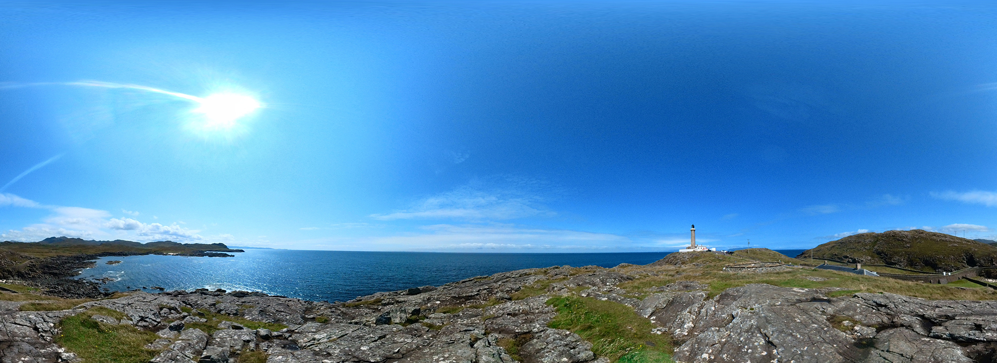A panoramic view of Ardnamurchan Lighthouse on a sunny day with blue skies Credit Kendra Turnbull