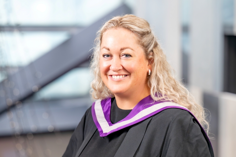 Lou-Hyett-Collins in graduation gown