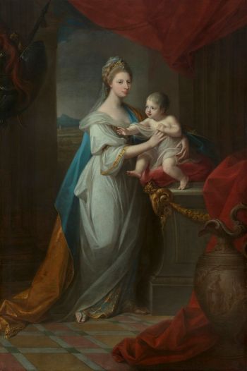 Woman dressed in a neo-classical, draped gown and robe, with an ornate diadem on her head. She is holding a baby, wrapped in drapery, and both are set in a neo-classical setting with draperies, columns and a vase.