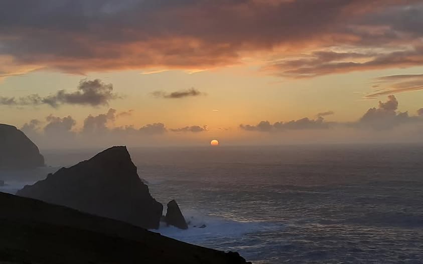A photograph showing sunset over shetland