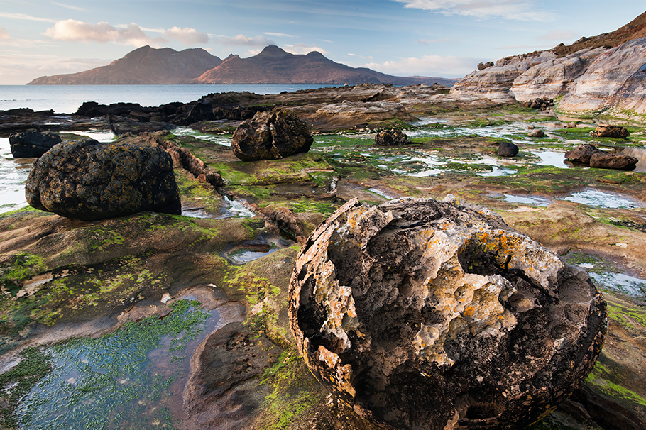 Rocky Shore and Mountains