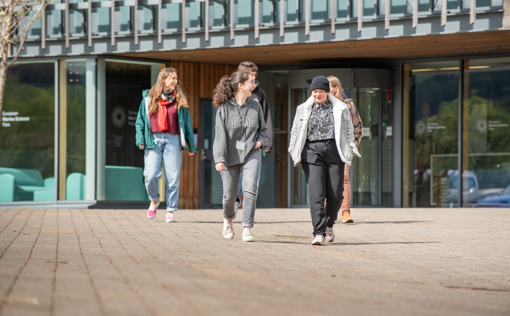 Students walking outside a campus