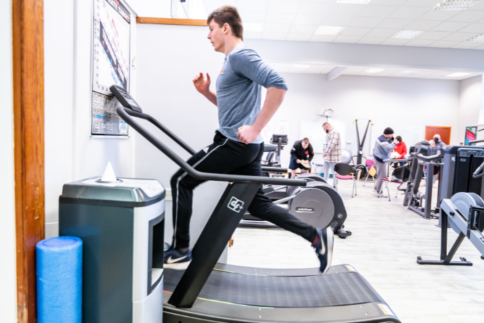 A student running on a treadmill at the fitness suite at UHI Moray