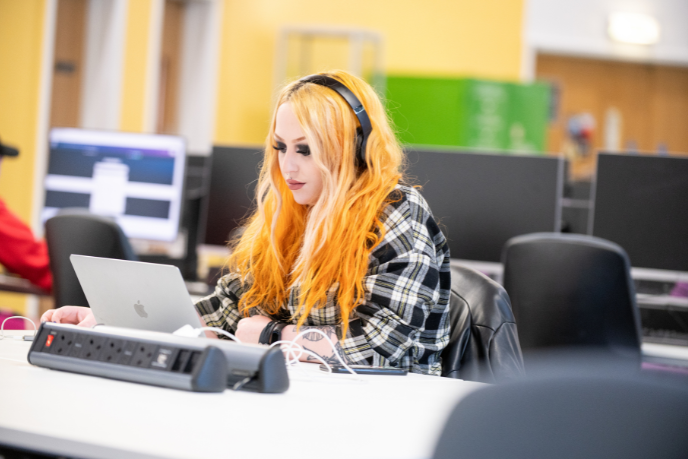 Student working on a digital tablet