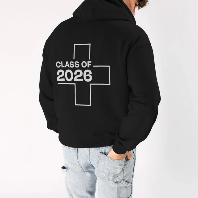 A person standing with their back to the camera and the UHI hoodie says 'Class of 2026 A person standing with their back to the camera and the UHI hoodie says 'Class of 2026